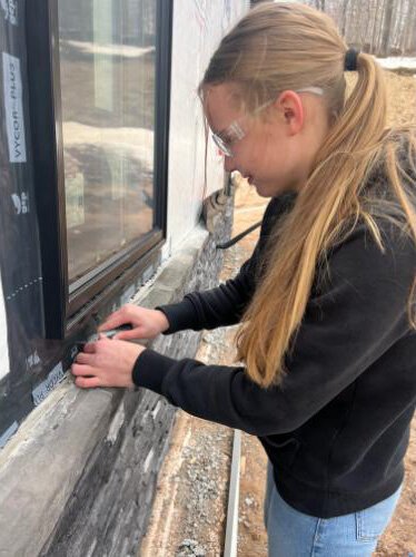 Alecia Aho, 17, is the first girl in the CCISD’s construction technology program.
