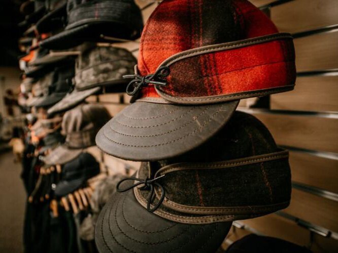 An array of the iconic Stormy Kromer caps on display at the company's store in Ironwood.