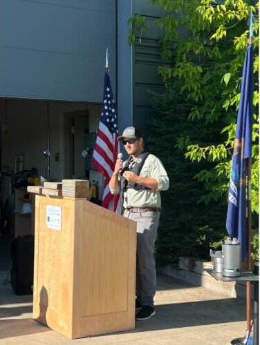 Travis White, a research engineer with Great Lakes Research Center, speaks at the launch of the Autonomous Surface Vessel.