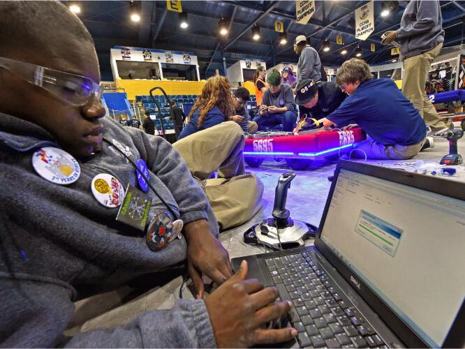 The LSSU FIRST robotics competition in action.