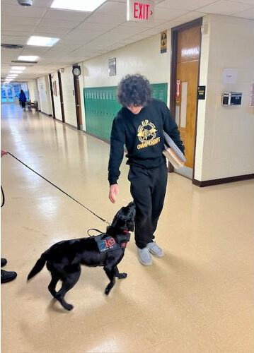 Nova checks out a student at LaSalle High School.