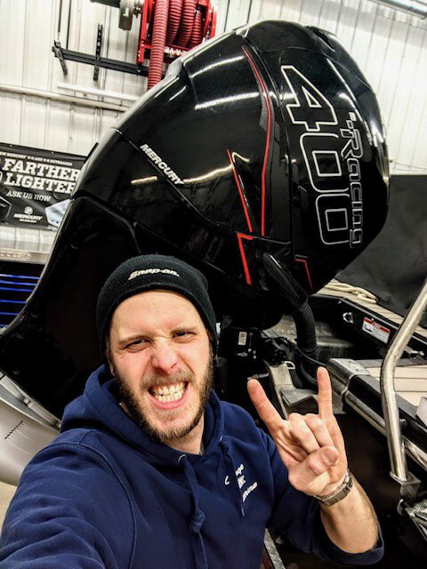 Kyle Faner working on a 400-horsepower engine at Gage Marine.