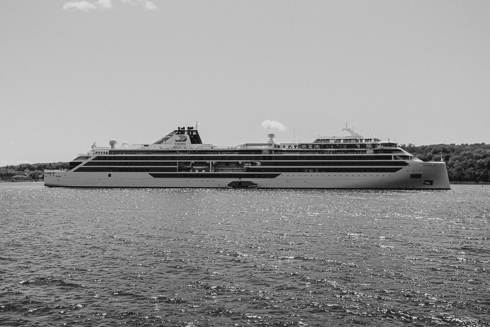 The Viking Octanis sails into Houghton, the first passenger cruise ship to visit the city in years.