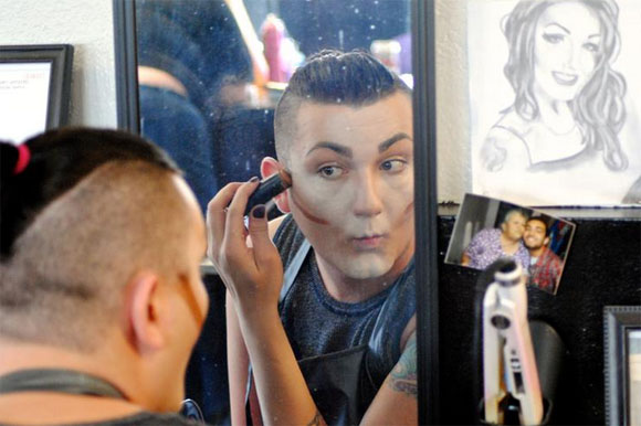 A practiced hand and an airbrush help transform faces.