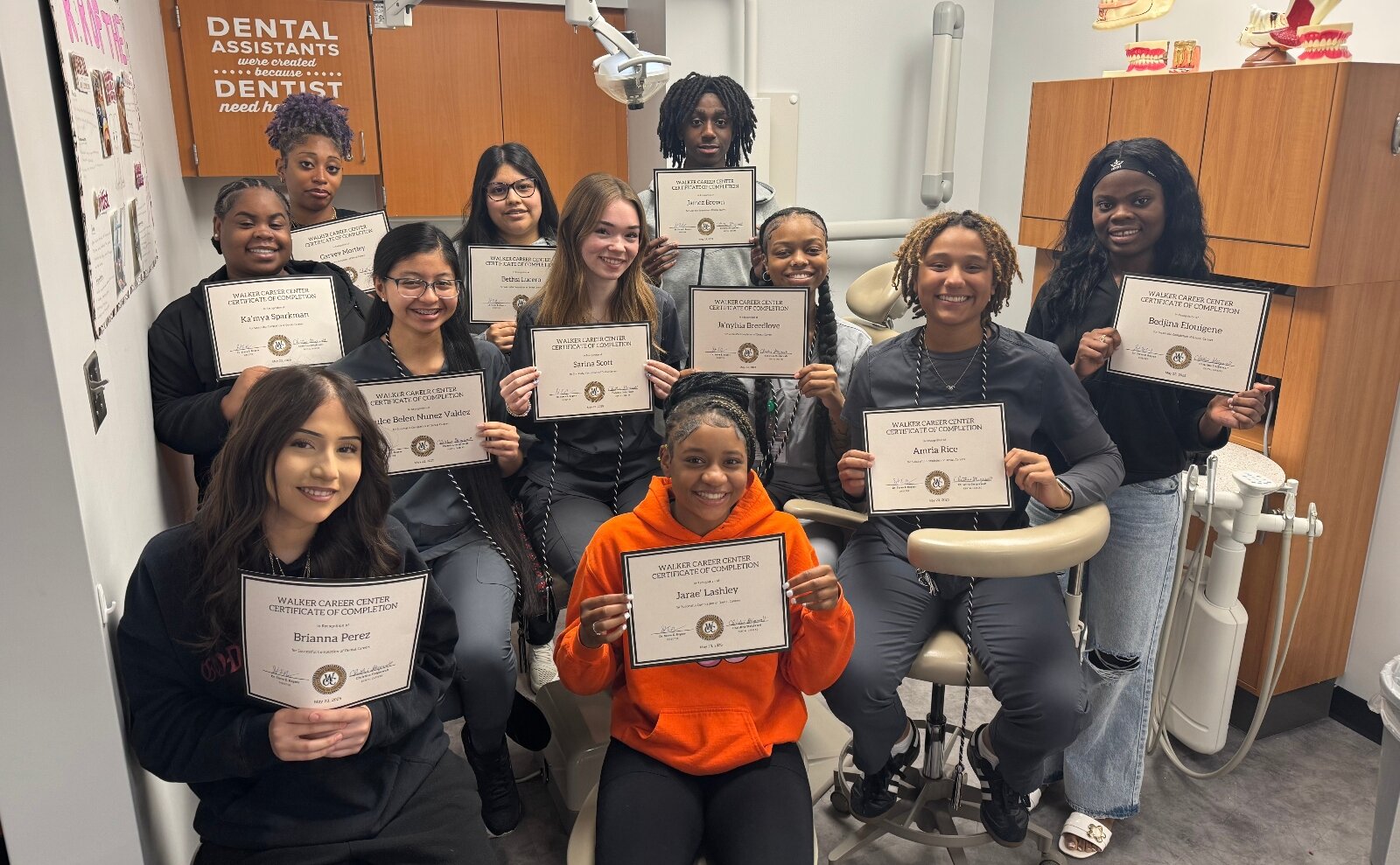 Walker Career Center students proudly display their earned certifications.