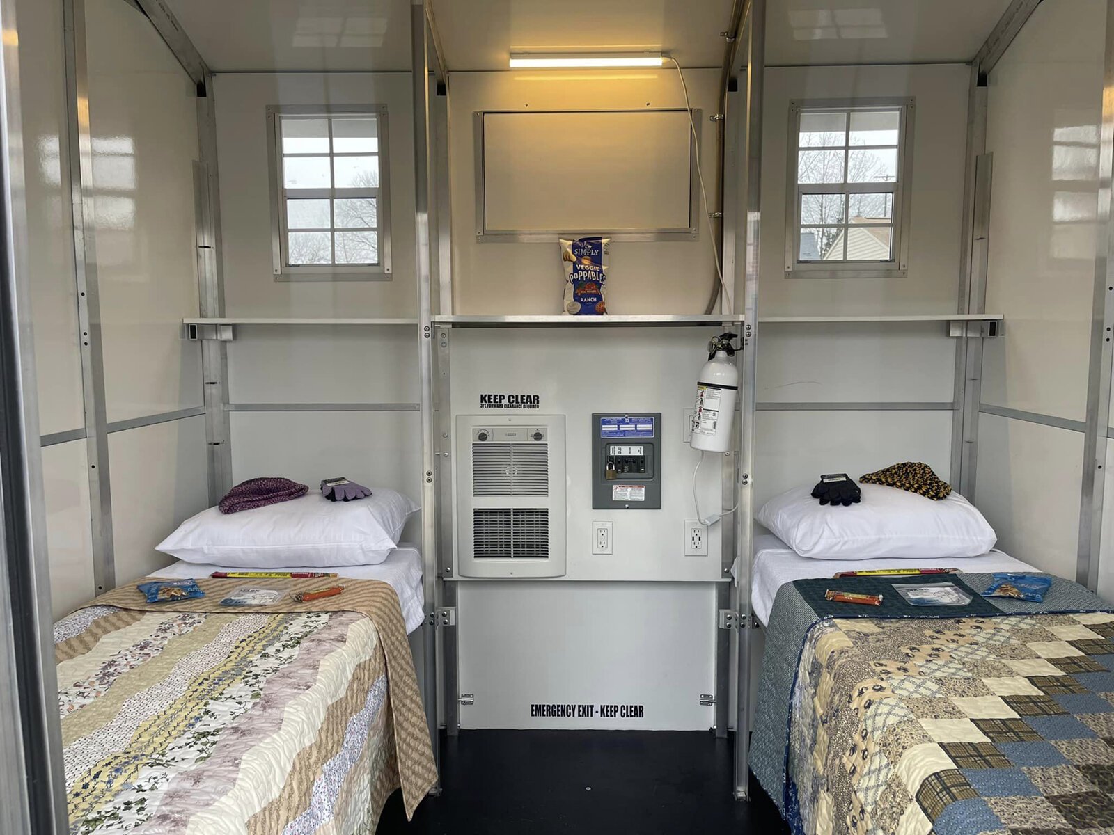 Inside a pallet house at Residents in Action's homeless shelter.