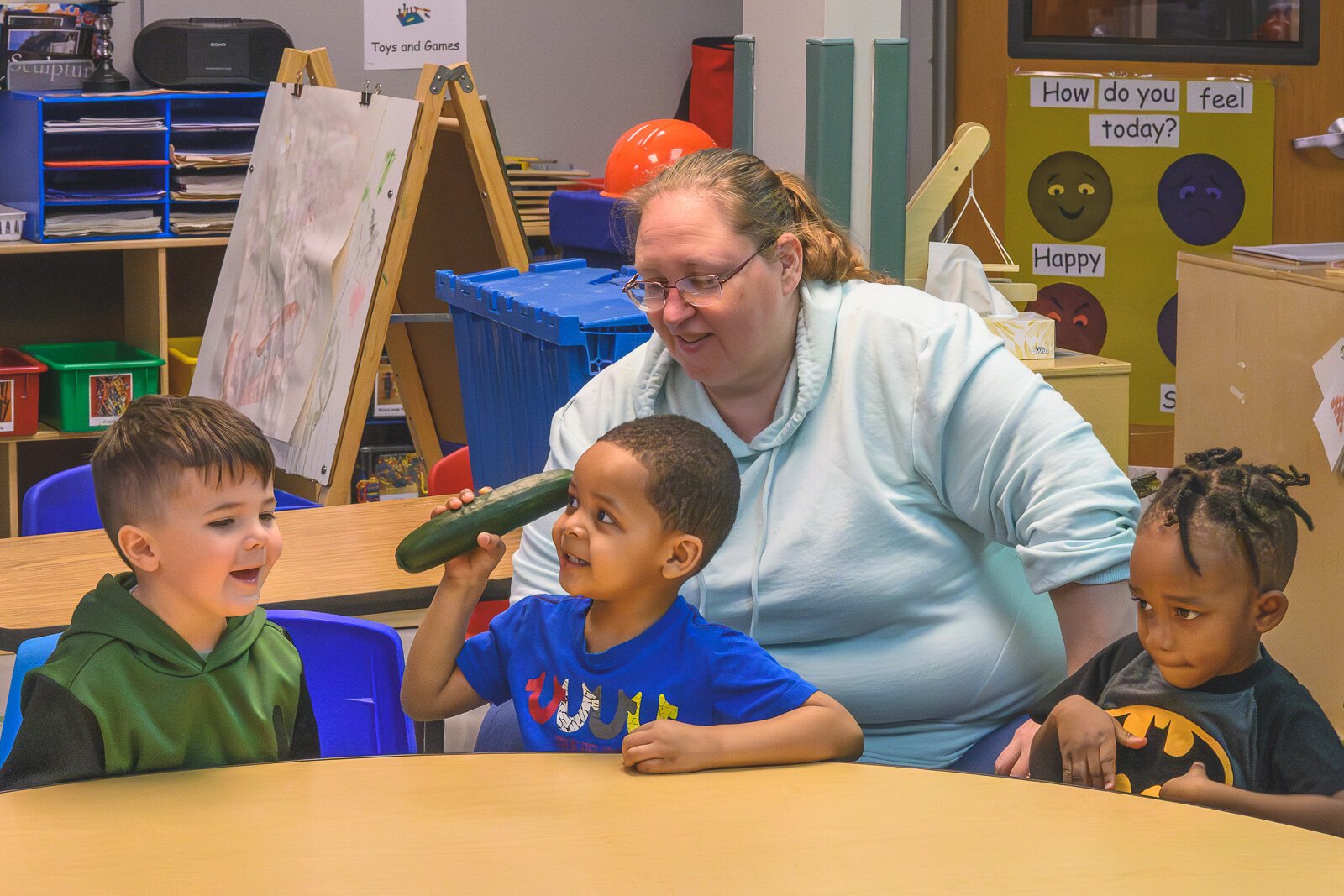 Head Start students at St. John's Universal Church of Christ in Jackson learn about cucumbers and dragonfruit in a lesson on mindful eating.