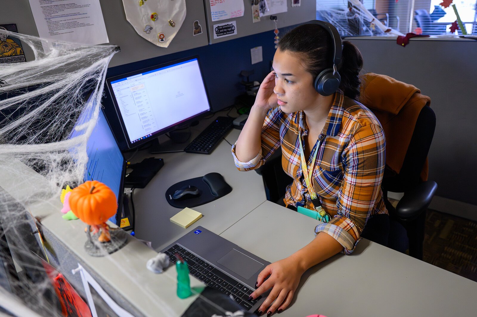 The #wishyouknew campaign creates a safe space where youth and adults can talk. Rachael Roston, WCCMH Crisis Team, fields a call.