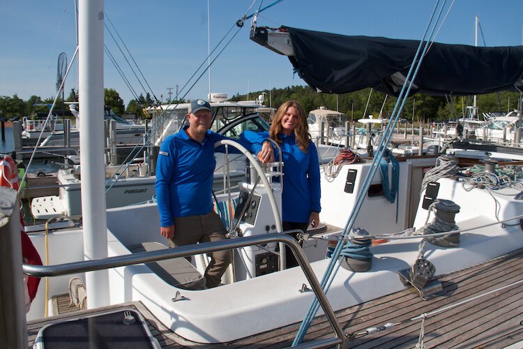 Kristen and Brian VanWieren, the owners of the U.P. Sailing Co., onboard Tsuru.