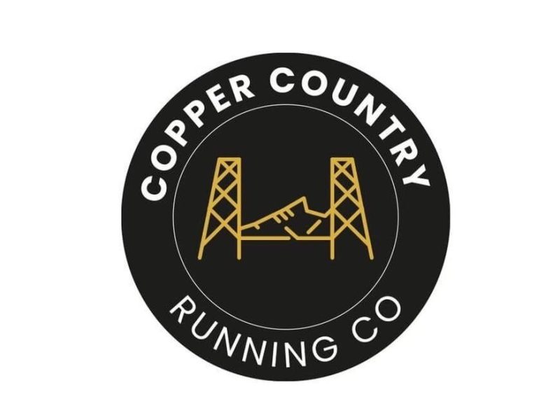 Copper Country Running Company logo features a spin on the Portage Lake Liftbridge connecting Houghton and Hancock.
